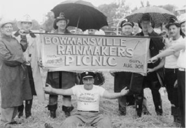 Picnicers w/ Sign